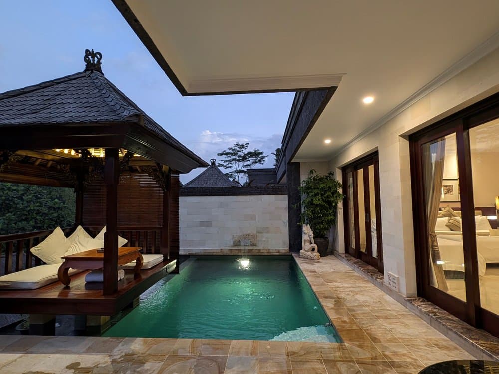 A private villa pool, directly accessible from the living space — exactly the kind of setup worth checking before you book with young kids.